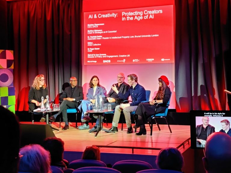 National reach A conference panel discussion featuring six speakers on a stage with a vibrant backdrop.