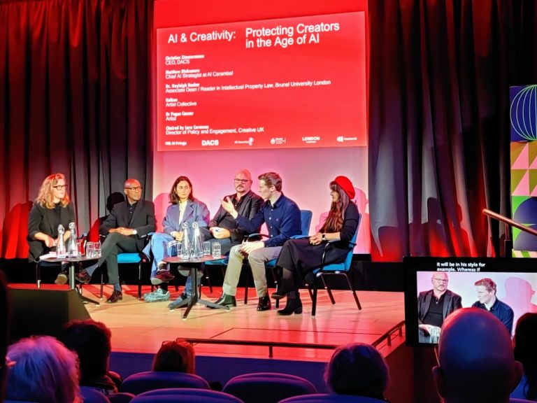 Business Content Standards A conference panel discussion featuring six speakers on a stage with a vibrant backdrop.